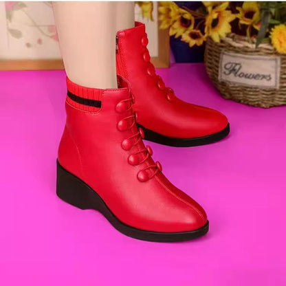 Botas de tacón oblicuo de piel suave para mujer