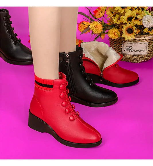 Botas de tacón oblicuo de piel suave para mujer